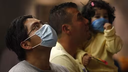 swine-flu-outbreak1391794c.jpg