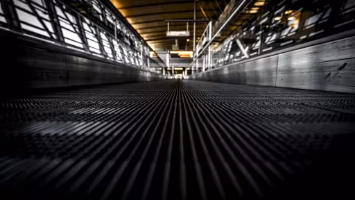 low-angle-shot-escalator-dirtproof-grating.jpg